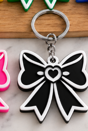 Black Bow Can Opener with colored bow and complete white outline, approved reference photo