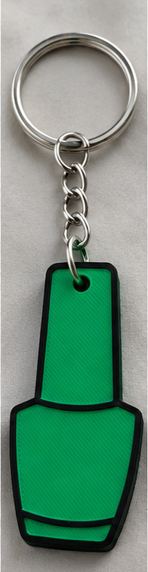 Green Nail Polish Can Opener with black top and black outline, approved upright reference photo