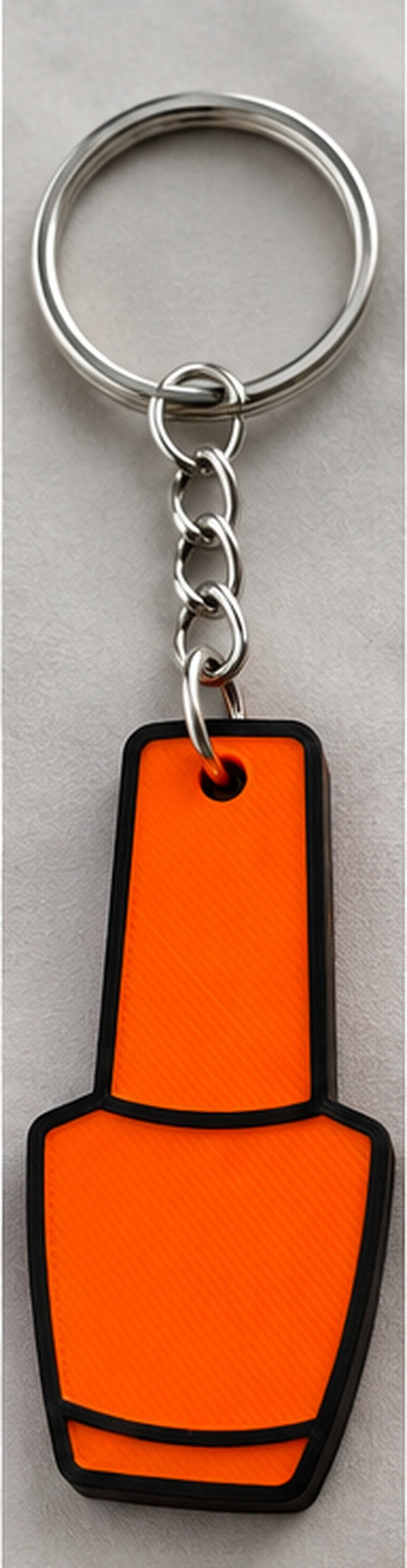 Orange Nail Polish Can Opener with black top and black outline, approved upright reference photo