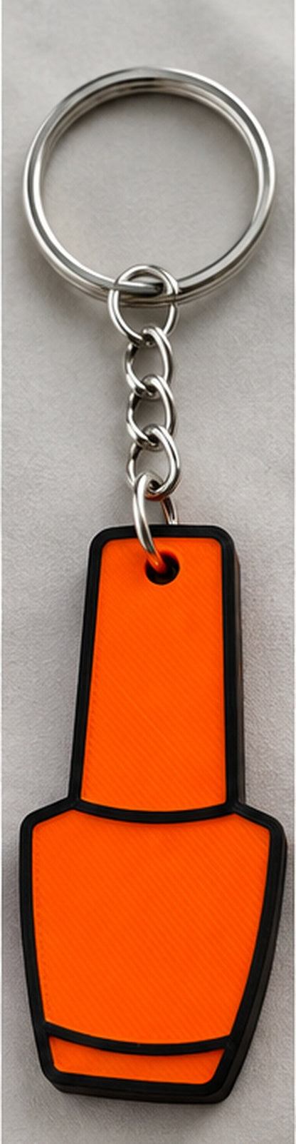 Orange Nail Polish Can Opener with black top and black outline, approved upright reference photo