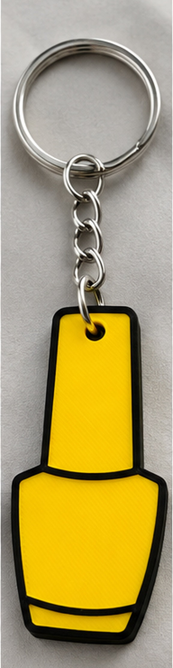 Yellow Nail Polish Can Opener with black top and black outline, approved upright reference photo