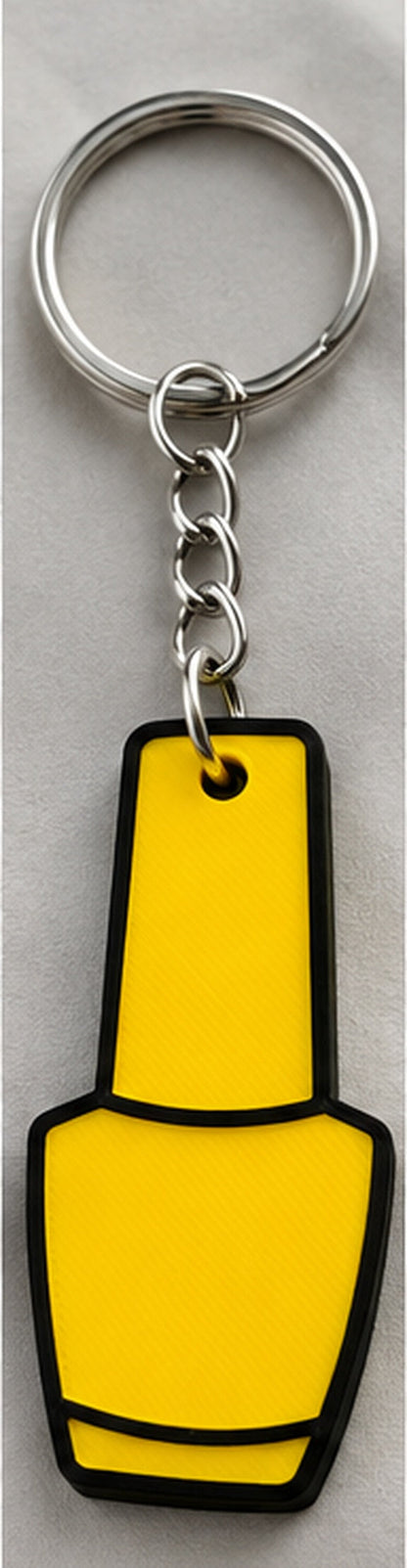 Yellow Nail Polish Can Opener with black top and black outline, approved upright reference photo