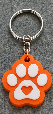 Orange base Paw Can Opener with white raised paw