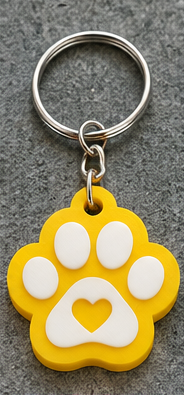 Yellow base Paw Can Opener with white raised paw